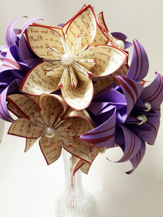 A Dozen Paper Flowers With Stargazer Lilies